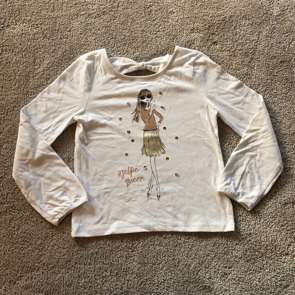 Girls white and gold long sleeve graphic tee. Size 5/6(S).